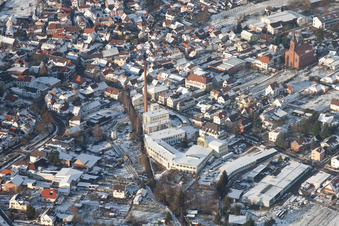 Aerial photograpy of Winterly Town View of the streets and houses of the residential areas in Albersweiler in the state Rhineland-Palatinate