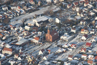 Oblique view of Winterly Town View of the streets and houses of the residential areas in Albersweiler in the state Rhineland-Palatinate