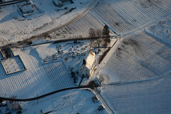 Wintry snowy Churches building the chapel Dyonisos in Gleiszellen-Gleishorbach in the state Rhineland-Palatinate, Germany