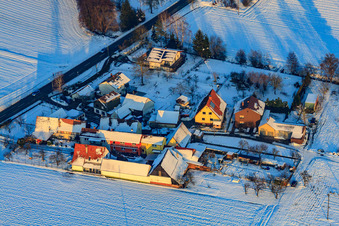 Welchhof district in winter with snow in Freckenfeld in the state Rhineland-Palatinate, Germany