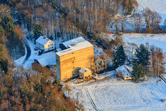 Aerial view of Hardtmühle in snow in winter in Kandel in the state Rhineland-Palatinate, Germany