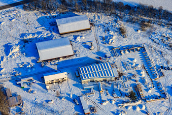 Aerial view of Sawmill in snow in winter in Hagenbach in the state Rhineland-Palatinate, Germany
