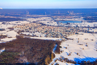 City view in snow in winter from the southwest in Hagenbach in the state Rhineland-Palatinate, Germany