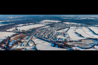 Village view in snow in winter from the west in Neuburg am Rhein in the state Rhineland-Palatinate, Germany from above