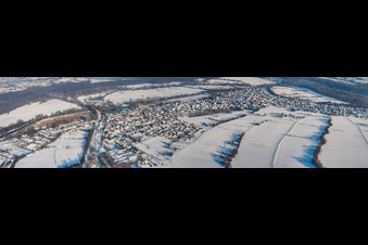 Panorama of the village view in snow in winter from the south in Neuburg am Rhein in the state Rhineland-Palatinate, Germany