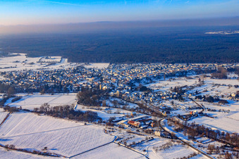 Aerial view of Village view in snow in winter from the east in Berg in the state Rhineland-Palatinate, Germany