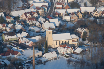 Drone recording of In winter when there is snow in Neewiller-près-Lauterbourg in the state Bas-Rhin, France