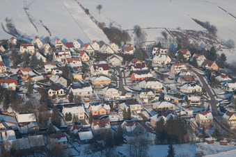In winter when there is snow in Neewiller-près-Lauterbourg in the state Bas-Rhin, France from the drone perspective