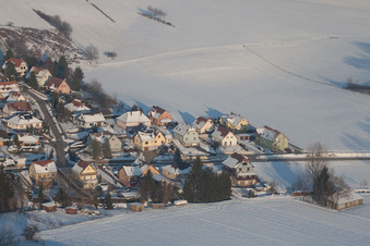 In winter when there is snow in Neewiller-près-Lauterbourg in the state Bas-Rhin, France from a drone