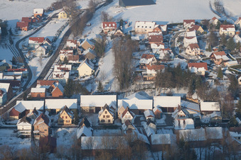 In winter when there is snow in Neewiller-près-Lauterbourg in the state Bas-Rhin, France seen from a drone