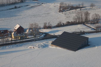 In winter when there is snow in Neewiller-près-Lauterbourg in the state Bas-Rhin, France from above