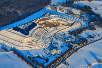 District landfill in snow in winter in Berg in the state Rhineland-Palatinate, Germany from above