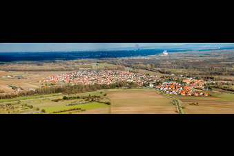 Panoramic perspective of Village - view on the edge of agricultural fields and farmland in Hoerdt in the state Rhineland-Palatinate, Germany