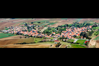 Village - view on the edge of agricultural fields and farmland in Hunspach in Grand Est, France