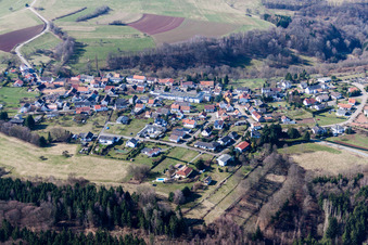 Aerial view of Village - view on the edge of agricultural fields and farmland in Schweix in the state Rhineland-Palatinate, Germany