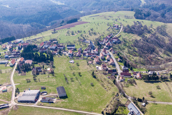 Aerial photograpy of Village - view on the edge of agricultural fields and farmland in Liederschiedt in Grand Est, France