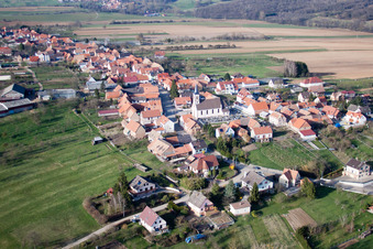 Village - view on the edge of agricultural fields and farmland in Forstheim in Grand Est, France