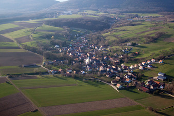 Aerial view of Village - view on the edge of agricultural fields and farmland in Drachenbronn-Birlenbach in Grand Est, France