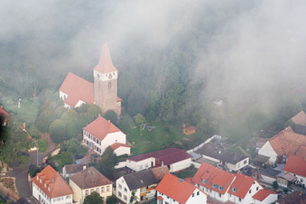 Protestant Church Minfeld in the fog in Minfeld in the state Rhineland-Palatinate, Germany