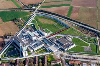 Aerial view of Prison grounds and high security fence Prison Justizvollzugsanstalt Stuttgart in Stammheim in the state Baden-Wurttemberg, Germany