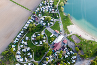 Aerial view of Camping with caravans and tents at the lake shore in Roeschwoog in Grand Est, France