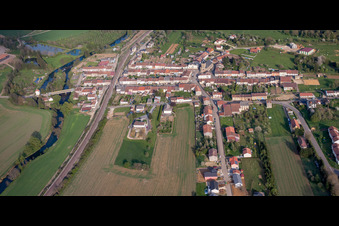 Aerial view of Village - view on the edge of agricultural fields and farmland in Charency-Vezin in Grand Est, France