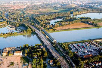 Oblique view of Rail and Street bridges construction across the Rhine river between Karlsruhe and Woerth am Rhein in the state Rhineland-Palatinate, Germany