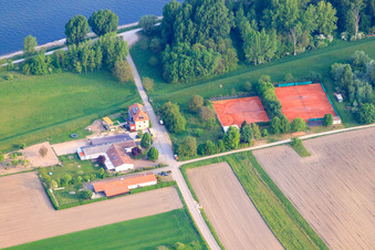Tennis courts on the banks of the Rhine at TennisClub Rheinsheim and clubhouses of WSC Rheintreue, Rheinsheim and KVB Rheinsheim in the district Rheinsheim in Philippsburg in the state Baden-Wuerttemberg, Germany