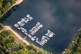 Pleasure boat marina with docks and moorings on the shore area Angelhofer Altrhein in Otterstadt in the state Rhineland-Palatinate