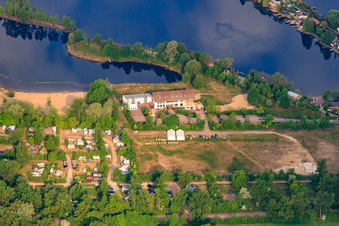 Hotel Darstein at the Adriatic pond and parking lot to the lido in Altrip in the state Rhineland-Palatinate, Germany
