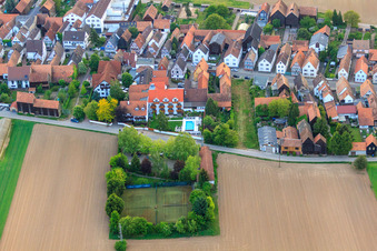 Tennis court, pool and parking behind the Hayna Hotel Krone in the district Hayna in Herxheim bei Landau in the state Rhineland-Palatinate, Germany