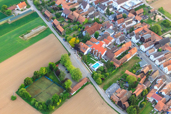 Oblique view of Tennis court, pool and parking behind the Hayna Hotel Krone in the district Hayna in Herxheim bei Landau in the state Rhineland-Palatinate, Germany