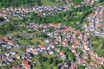 Village view from the east with St. Pirminius Church in Eppenbrunn in the state Rhineland-Palatinate, Germany