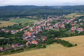 Village - view on the edge of agricultural fields and farmland in Wienrode in the state Saxony-Anhalt, Germany
