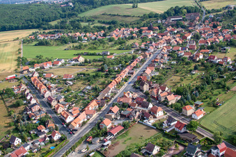 Village - view on the edge of agricultural fields and farmland in Cattenstedt in the state Saxony-Anhalt, Germany
