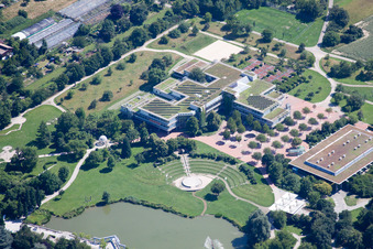 Park of Horbachpark with lake Hoebach , Anne-Frank school and Albgauhalle in Ettlingen in the state Baden-Wurttemberg