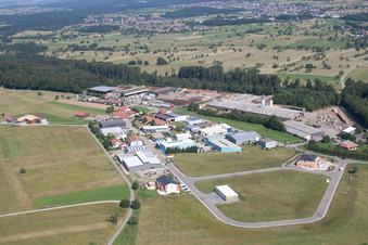 Building and production halls on the premises of corthum Nordschwarzwald GmbH - corthum Erdenwerk in the district Pfaffenrot in Marxzell in the state Baden-Wurttemberg from the plane