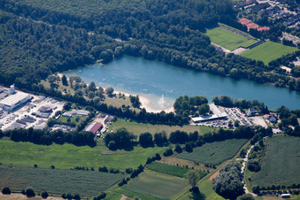 Beach and the shore areas of the lake Badesee Buchtzig in Ettlingen in the state Baden-Wurttemberg