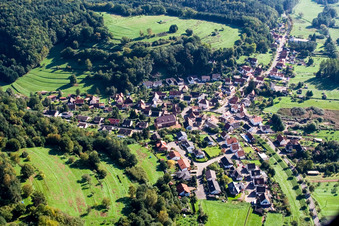 Aerial photograpy of Village - view on the edge of agricultural fields and farmland in Niederschlettenbach in the state Rhineland-Palatinate