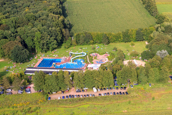 Forest swimming pool Kandel with full sunbathing lawns and pools in Kandel in the state Rhineland-Palatinate, Germany