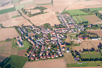 Aerial photograpy of Village - view on the edge of agricultural fields and farmland in Lautersheim in the state Rhineland-Palatinate, Germany
