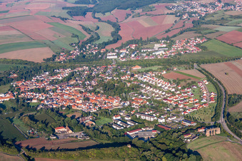 Village - view on the edge of agricultural fields and farmland in Marnheim in the state Rhineland-Palatinate, Germany