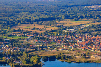 City view behind Schauffele Lake in Wörth am Rhein in the state Rhineland-Palatinate, Germany