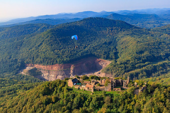 Oblique view of Paraglider over the Madenburg in Eschbach in the state Rhineland-Palatinate, Germany