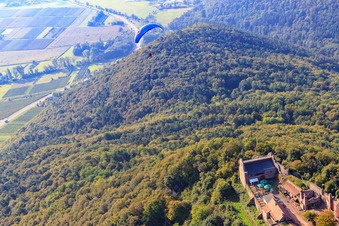 Paraglider over the Madenburg in Eschbach in the state Rhineland-Palatinate, Germany out of the air