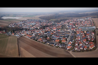 Village - view on the edge of agricultural fields and farmland in Kuhardt in the state Rhineland-Palatinate, Germany from above