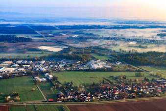 Horst industrial estate in the morning mist from the south in the district Minderslachen in Kandel in the state Rhineland-Palatinate, Germany