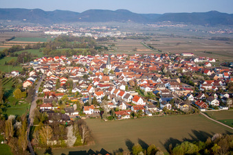 Village - view on the edge of agricultural fields and farmland in Venningen in the state Rhineland-Palatinate, Germany from the plane