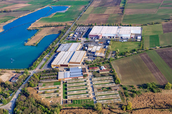 Aerial view of Hego Düngemittelwerk GmbH and TST Trans Service Team GmbH in Gimbsheim in the state Rhineland-Palatinate, Germany