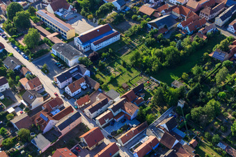 Oblique view of Mundoplatz, primary school and Mundohalle in Minfeld in the state Rhineland-Palatinate, Germany